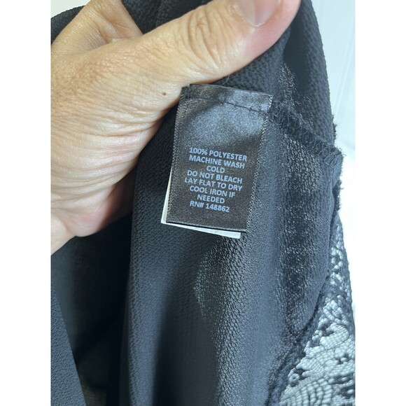 Torrid Sz 3 Black top. Lace shoulder and hem. Deed "V" back. Perfect summer top. - Picture 6 of 6